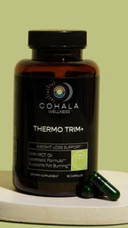 COHALA Wellness Thermo Trim+ supplement bottle with two green capsules on a pale green background